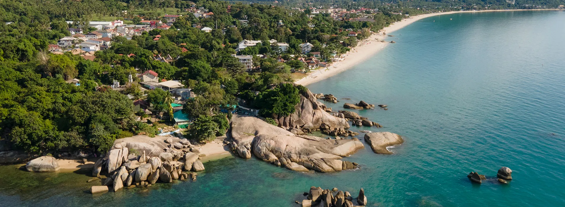 homm chura samui thailand aerial view with greenery and blue seas